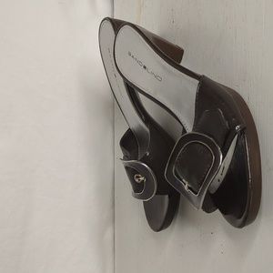Bandolino patent leather black size 7 1/2m slip on sandal  adjustable buckle